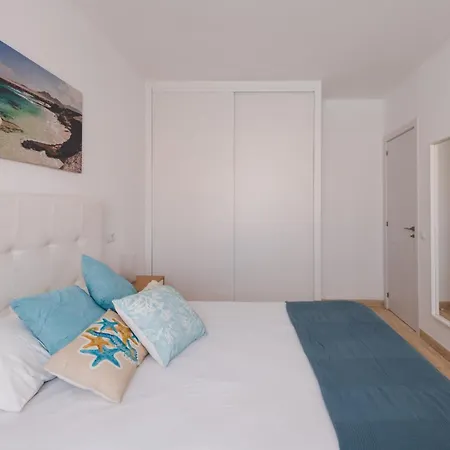 Em Holidays קורלחו